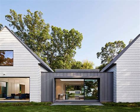 2 houses connected by metal roof breezeway|opening a breezeway roof.